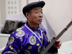 MS TD Folk artists of Chinese shadow play troupe playing  accompaniment with traditional music instrument during Chinese spring festival AUDIO / xi'an, shaanxi, china Stock Footage