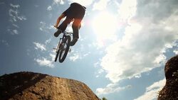HD Super Slow-Mo: Superman Bmx Trick Stock Footage
