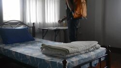 Young man traveler in the hostel Stock Footage