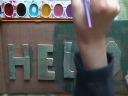 Kids Painting A Hello Sign - NTSC DV Stock Footage