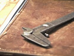 Old caliper with leather map-case Stock Footage