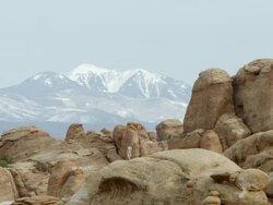 Sandstone layers with the La Sal Mountains Stock Footage