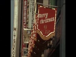 SYND 23 12 74 CHRISTMAS SHOPPING IN TOKYO News Clip