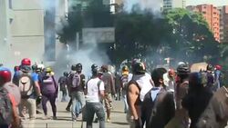 CLEAN : Tear gas fired as clashes intensify in Venezuela's capital News Clip