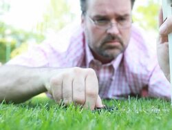 Man cutting grass Stock Footage