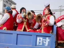 MS TS Villagers performing gongs and drums in traditional festive folk celebration or carnival during chinese spring festival  AUDIO   / xi'an, shaanxi, china Stock Footage