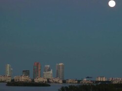 Moon rise over South Beach Stock Footage