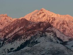 WS View of snow capped mountain at dusk in Wasatch Range / Utah, United States Stock Footage