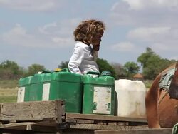 CU Shot of Family collecting water from shafts / Pilao Arcado, Bahia, Brazil Stock Footage
