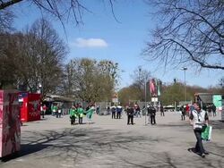 Long shot of fans arriving at stadium. General Stock Footage