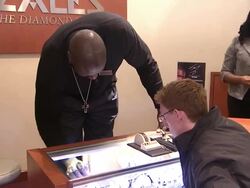 Shaquille O'Neal at Shaquille O'Neal Surprises Holiday Shoppers By "Working" Behind Counter At Zales Jewelers' 5th Avenue Stock Footage