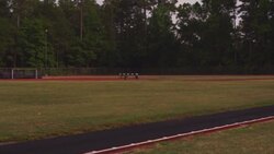 A track athlete practices his pole-vaulting. Stock Footage