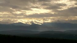 SUNBEAMS IN THE MOUNTAINS AND FOREST Stock Footage