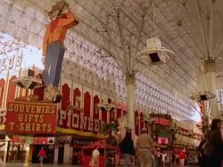 MS View of Under Fremont Street canopy in Pioneer casino and People come & go / Las Vegas,Nevada,United States Stock Footage