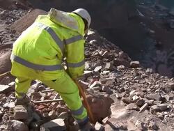 MS Worker preparing blasting operation at quarry / Taben-Rodt, Rhineland-Palatinate, Germany Stock Footage