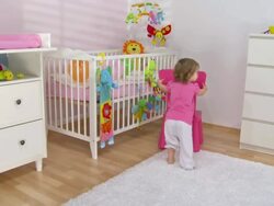 HD CRANE: Baby Girl Pushing Her Stool Stock Footage