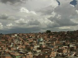 WS T/L Red rooftops with lights shadows spreading on it / Rio, Brazil Stock Footage