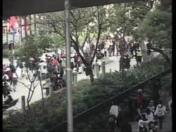 Migrant workers march to protest against proposed wage levy News Clip