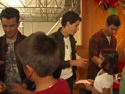 Kevin Jonas (L), Nick Jonas and Joe Jonas at the Jonas Brothers Surprise Stock Footage