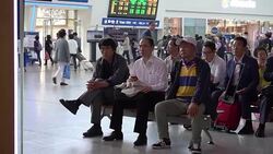 CLEAN : South Koreans watch news of latest missile test News Clip