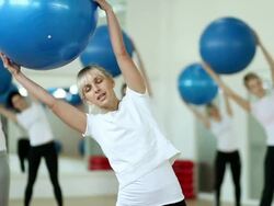 Workout with gymnastic ball Stock Footage