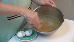 Mixing two eggs to dough mixture Stock Footage
