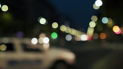 Out of focus traffic lights background. Stock Footage