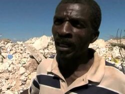 VOICED: Haiti's quake victims search the debris for precious objects News Clip