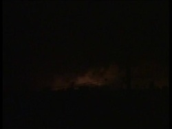 Night shots of US and Iraqi troop action against insurgents News Clip