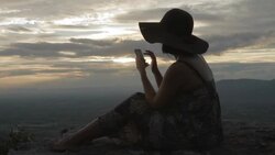woman using smartphone connect from mountain top Stock Footage