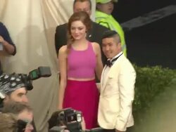 Emma Stone and Thakoon Panichgul  - 'Charles James: Beyond Fashion' Costume Institute Gala - Arrivals Stock Footage
