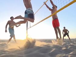 Men playing beach volleyball. - Slow Motion - filmed at 240 fps Stock Footage