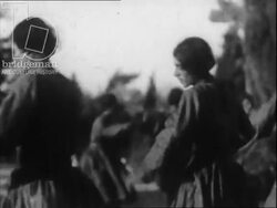 Afghanistan 1945 - men perform traditional Attan dance. CU shots of smiling men in turbans. Stock Footage