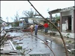Gustav hit the Isla de la Juventud south of the Cuban mainland just short of a top-scale Category 5 hurricane with screaming 140 mph winds that toppled telephone poles and fruit trees, shattered windows and leveled some homes. News Clip