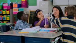 Teacher explains turbine to students Stock Footage