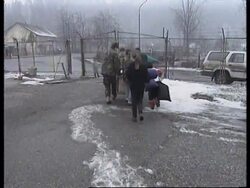 BOSNIA:OSKOVA: REFUGEES RECEIVE WINTER AID FROM GERMAN AID GROUP News Clip