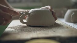 Hands working on ceramics Stock Footage