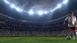 Soccer player dribbling a ball on the field Stock Footage