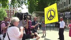 CLEAN : London: Protesters call for de escalation of US North Korea spat News Clip