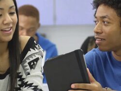 Close up of Two Students Using a Digital Tablet Computer Stock Footage