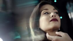 Charming man turns girl's head for a kiss in backseat of limousine at awards show Stock Footage