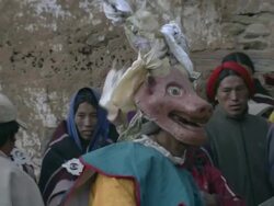 MS Dancer in costume at Bon-Po religious festival at ringmo monastery and onlookers  / Himalayas, Upper Dolpo, Nepal   Stock Footage