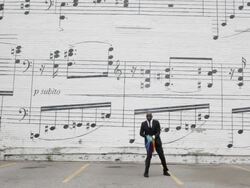 MS Young man dressed up in black suit and dancing / Minneapolis, Minnesota, United States Stock Footage