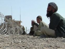February 2009 MS Workers making barbed wire fence / Bakwa, Farah Province, Afghanistan Stock Footage