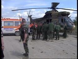ALBANIA: KOSOVO CRISIS: INJURED MAN AIRLIFTED OUT News Clip