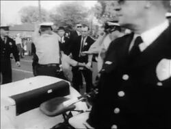 B/W 1963 policemen using force to arrest angry Black woman at civil rights protest / Alabama / news. Stock Footage
