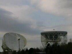 T/L Jodrell Bank, Observatory, part of the School of Physics and Astronomy at The University of Manchester.  Lovell Radio Telescope Stock Footage