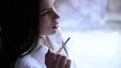 Woman smoking Stock Footage