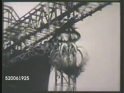 1942: JAPAN: WARSHIP LAUNCHING: XWS Warehouses & cranes along harbor. WS Ball exploding during celebration of warship launching. VS Ship launching from dock into water, ship moving w/ silhouettes of men onboard. WWII, Imperial Japanese Navy, IJN Instructional Video