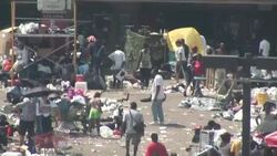 Deplorable conditions for Katrina Survivors at the Superdome Stock Footage